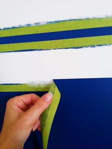 Painting stripes on a wall from About Murals.
