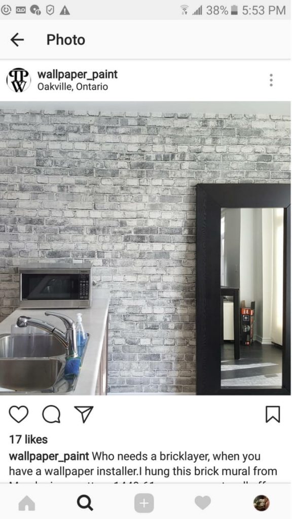 Old Brick Wall Mural Black and White, as seen in this kitchen, is a grey brick wallpaper sold by AboutMurals.ca.