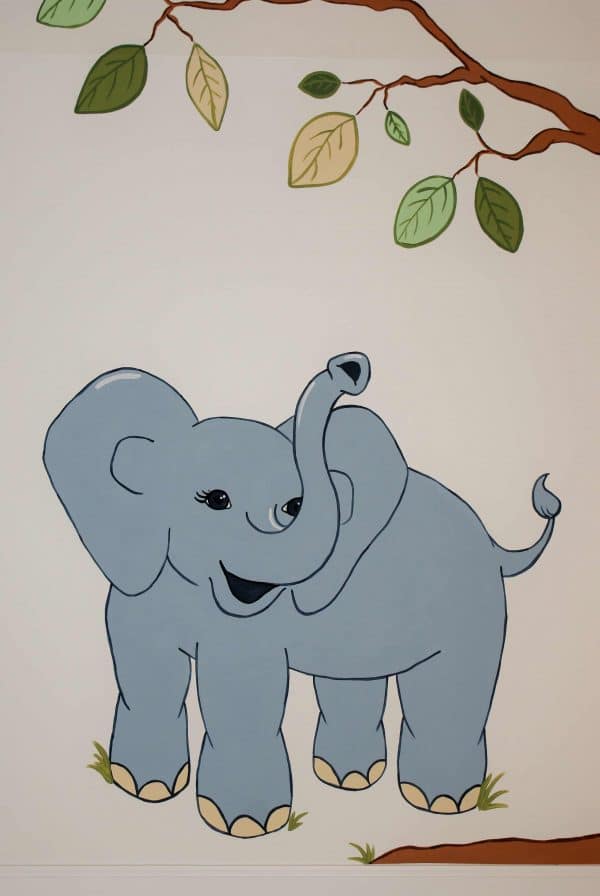 Muralist Adrienne of AboutMurals.ca painted this baby blue elephant in a nursery mural