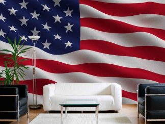 American Flag Wallpaper, as seen on the wall of this living room, features the famous stars and stripes of the USA blowing in the wind from About Murals.