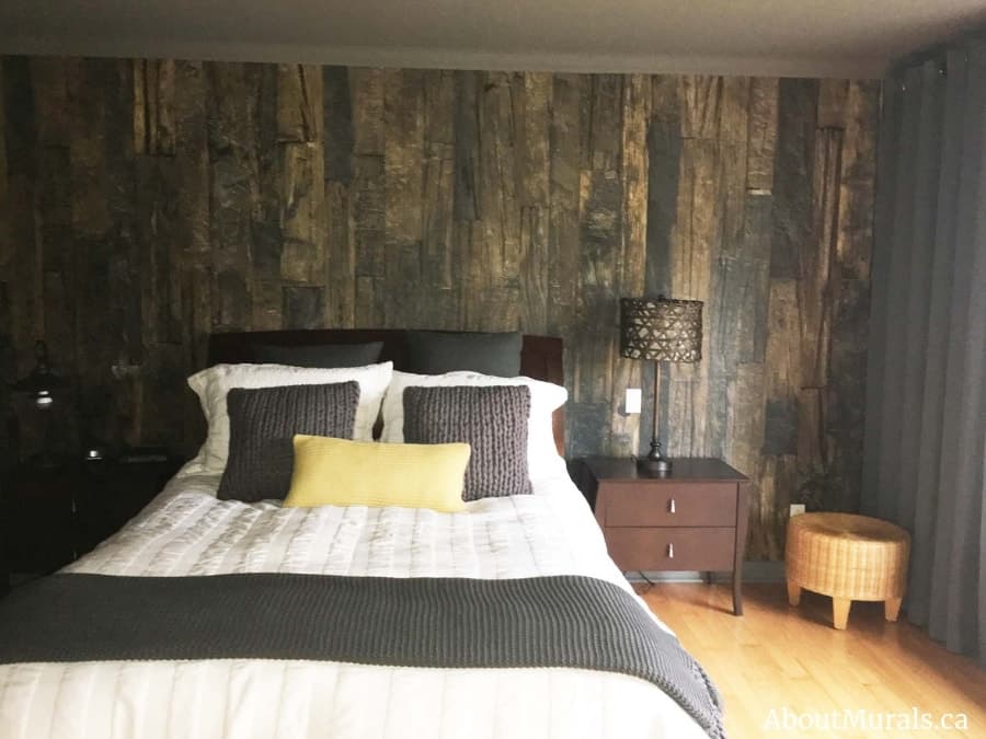 An antique wood wall mural in a bedroom. Removable wallpaper sold by AboutMurals.ca.