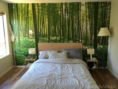 Bamboo Forest Wall Mural, as seen in this bedroom, feels natural with its tall, green bamboo trees. Forest wallpaper sold by AboutMurals.ca.