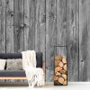 Barn Wood Wall Mural Black and White, as seen in this rustic living room, is a realistic grey wood wallpaper from About Murals.