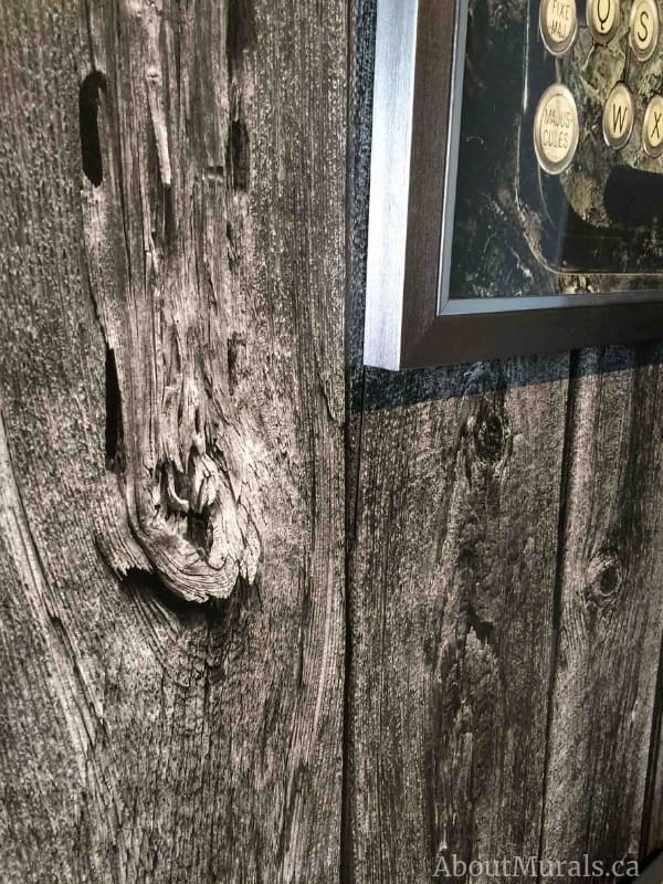Barn Wood Wallpaper, as seen up close on this wall, creates a realistic, rustic feeling with its reclaimed wooden planks. Wood wallpaper sold by AboutMurals.ca.