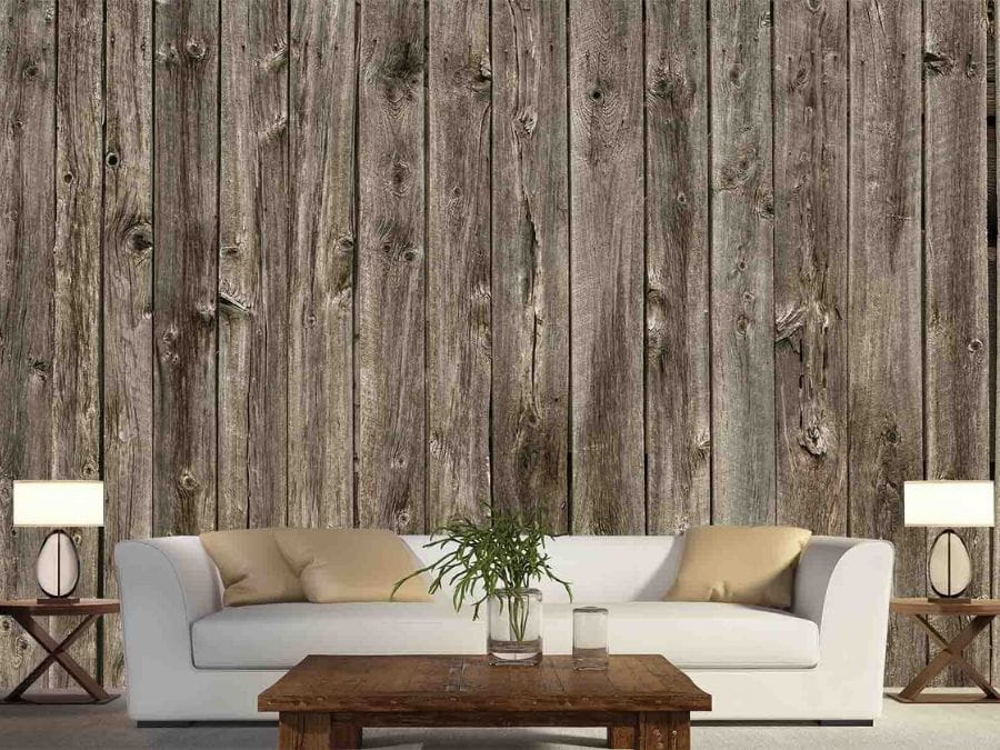 Barn Wood Wallpaper, as seen on the wall of this brown farmhouse living room, is a photo mural of realistic wood planks in brown from About Murals.
