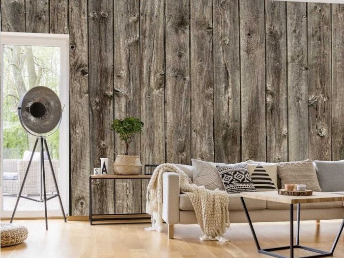 Barn Wood Wallpaper, as seen on the wall of this living room, creates a rustic, realistic look from About Murals.