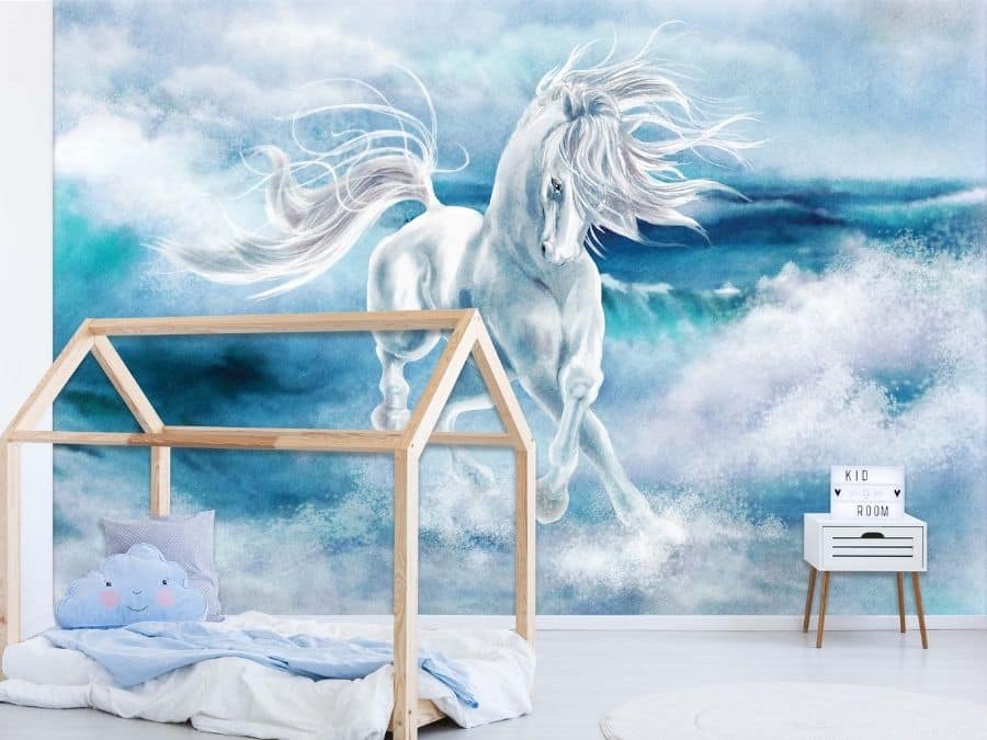 Blue Horse Wallpaper, as seen on the wall of this bedroom, is an animal mural of a magical white horse running through blue ocean waves from About Murals.