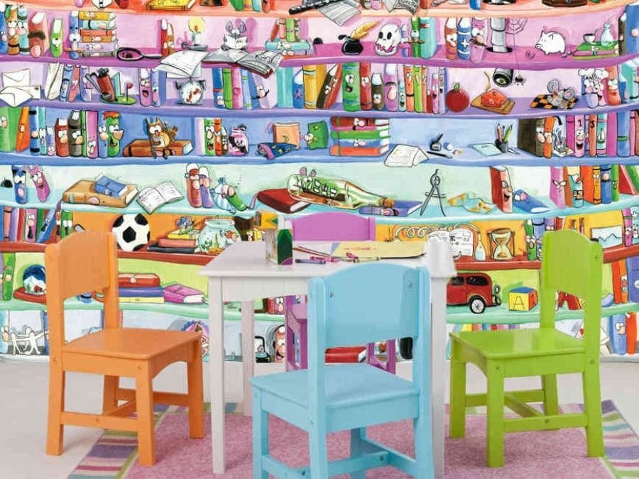 Bookcase Wall Mural, as seen in this playroom, is a kids wallpaper featuring whimsical books, toys and trinkets from About Murals.