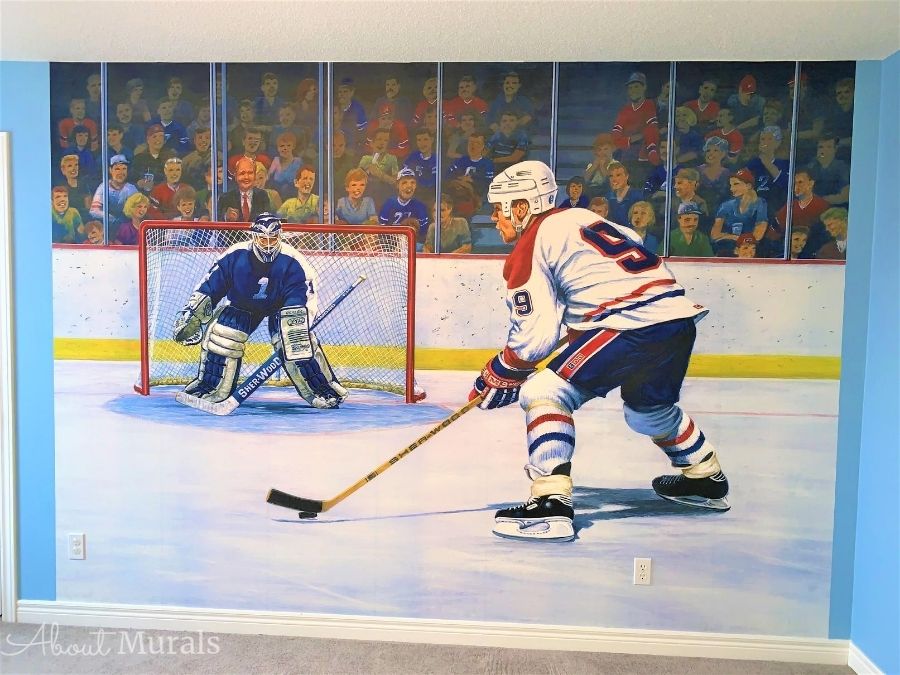 Breakaway Wall Mural, as seen in this boys bedroom, features hockey players inspired by the Toronto Maple Leafs and Montreal Canadiens. Hockey wallpaper sold by AboutMurals.ca.
