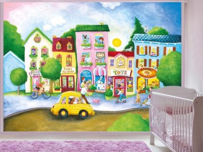 Candy Street Wall Mural, as seen in this bedroom, is a kids wallpaper of a cute city featuring a bakery, circus school, pet shop, chocolate store and toy shop from About Murals.