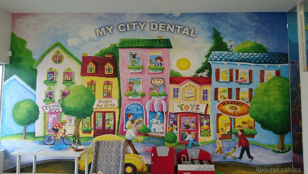Candy Street Wall Mural, as seen in this dentist office, features children's favourite shops like a circus school, pet shop, bakery, candy store and toy store. Kids wallpaper sold by AboutMurals.ca