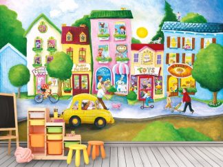 Children’s Town Wallpaper Mural, as seen on the wall of this playroom, features a cartoon town with a circus school, pet shop, candy store, toy shop and bakery from About Murals.