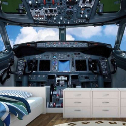 Cockpit Airplane Wallpaper, as seen on the wall of this kids room, features a plane's control panel flying through a blue, cloudy sky from About Murals.