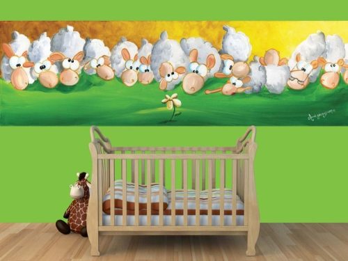 Cute Sheep Wallpaper, as seen on the wall of this nursery, features fluffy white sheep on a green and yellow background from About Murals.