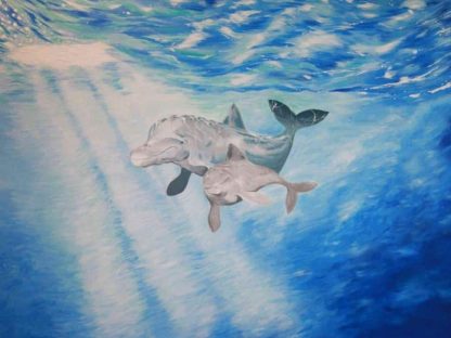 Dolphin Wallpaper is an under the sea mural with two blue dolphins swimming underwater from About Murals.