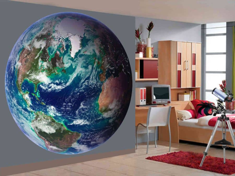 Earth Wallpaper, as seen on the wall of this bedroom, is a photo mural with an aerial view of North America, South America and Europe under cloud cover from space from About Murals.