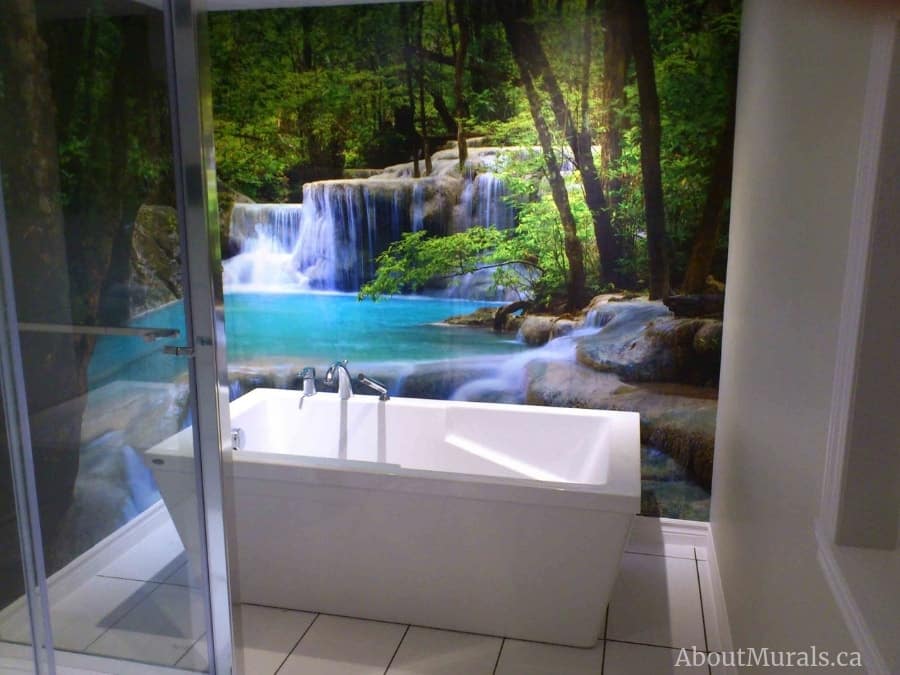 Erawan Waterfalls Thailand wall mural, as seen on the wall of this bathroom, features turquoise falls in a forest. Removable wallpaper sold by AboutMurals.ca