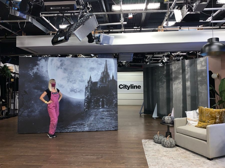 Fir Forest Wallpaper, as seen in the Cityline Studio in Toronto, is a black and white photo mural of tall misty trees in a forest from About Murals.