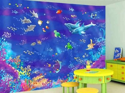 Fish Wall Mural, as seen in this kids room, is an underwater wallpaper featuring fish, sharks, dolphins, turtles and coral from About Murals.