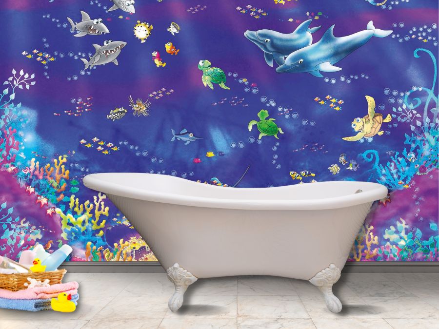 Fish Wall Mural, as seen on the wall of this underwater themed bathroom, is a kids wallpaper featuring dolphins, sharks, sea turtles and fish swimming under the sea in colourful coral from About Murals.