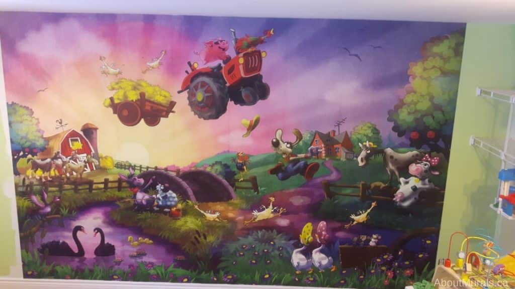 Funny Farm Wall Mural, as seen in this playroom, features a cow, horse, chickens, pig, rooster, lamb and donkeys on a farm acting silly. Kids wallpaper sold by AboutMurals.ca.