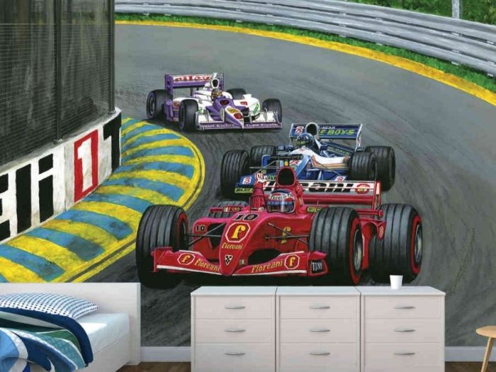 Grand Prix Wall Mural, as seen in this bedroom, features race cars speeding on a track from About Murals.