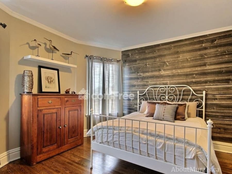 Horizontal Barn Wood Wallpaper, as seen in this bedroom, creates a rustic, textured look on walls with its realistic brown wooden planks. Wood wallpaper sold by AboutMurals.ca.