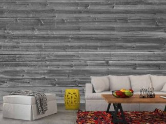Horizontal Barn Wood Wall Mural Black and White, as seen in this living room, is a realistic grey wood wallpaper full of texture from About Murals.