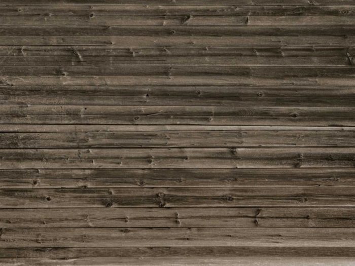 Horizontal Barn Wood Wallpaper features realistic brown wooden planks from About Murals