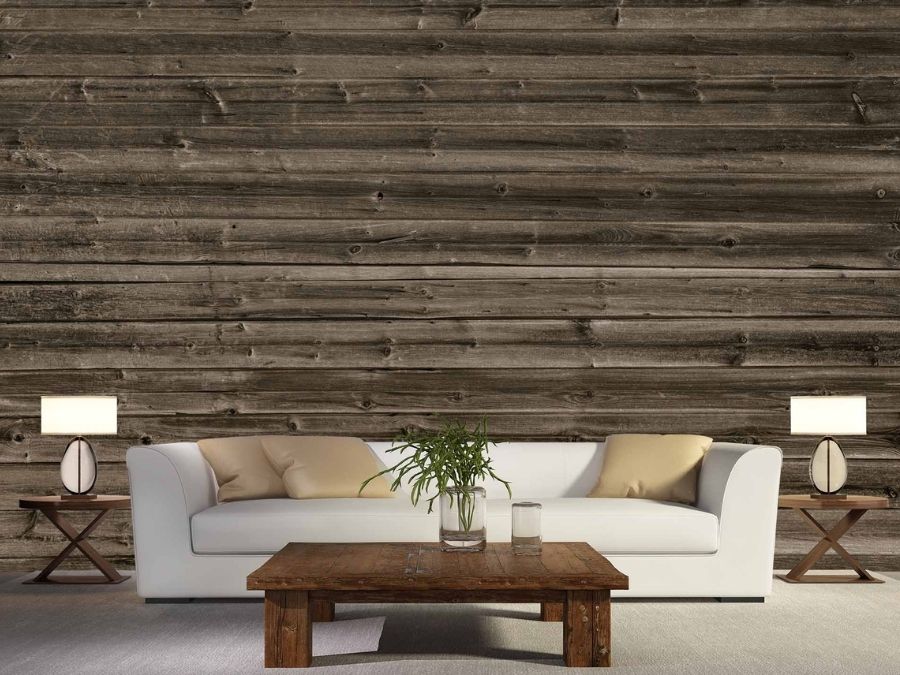 Horizontal Barn Wood Wallpaper, as seen on the wall of this brown rustic living room, is a realistic photo mural of wooden planks from About Murals.