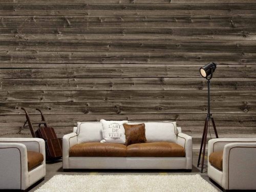 Horizontal Barn Wood Wallpaper, as seen on the wall of this living room, features a realistic, rustic looking wooden plank design from About Murals.
