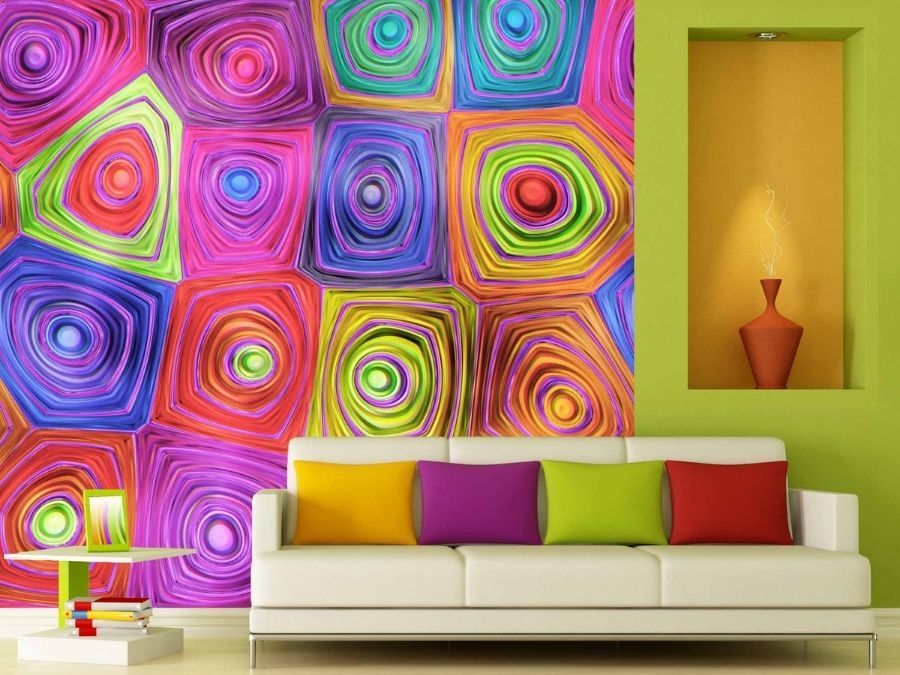 Hypnosis Wall Mural is a psychedelic wallpaper full of rainbow colours geometric shapes from About Murals.