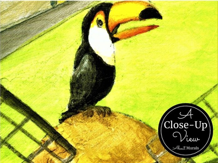 A close-up view of a toucan on a windmill in Holland from a kids travel wallpaper sold by About Murals.