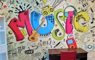 Let's Get Musical Wall Mural, as seen in this homework study, features a graffiti inspired music illustration printed on removable wallpaper sold by AboutMurals.ca