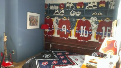 Locker Room Wall Mural, as seen in this Montreal Canadiens bedroom, is a painting of red and blue hockey jerseys hanging in cubby holes. Kids wallpaper sold by AboutMurals.ca.