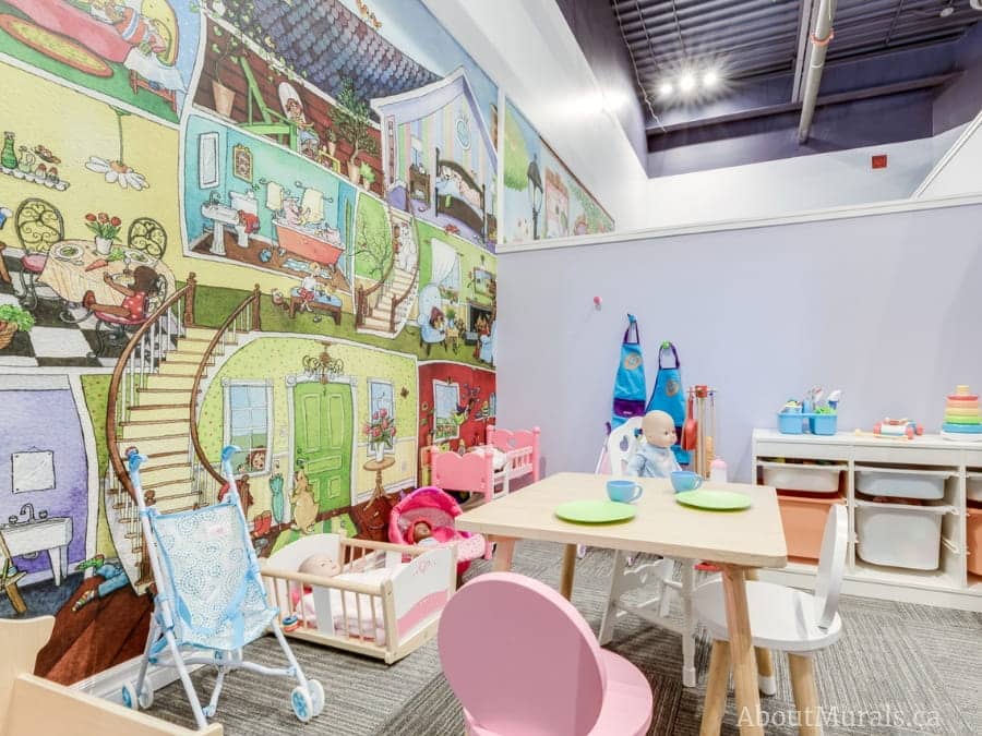Playhouse Wallpaper, as seen on the walls of this indoor play center, features animals in a doll house. Kids wallpaper sold by About Murals.