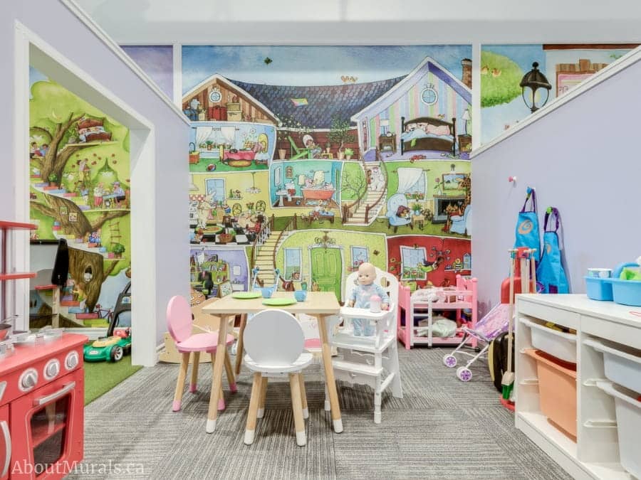 Playhouse Wallpaper, as seen on the wall of this indoor playground, features a pig, cow, elephant, zebra, giraffe, dog and rabbit in a doll house. Kids wallpaper sold by AboutMurals.ca.