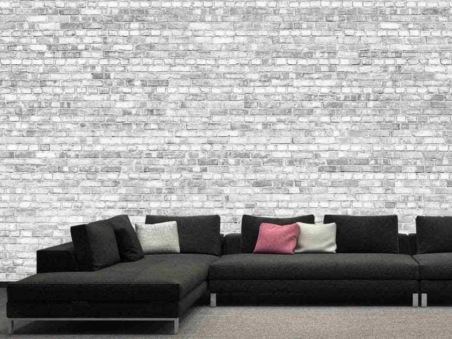 Old Brick Wall Mural Light Black and White, as seen in this black living room, is a texture brick wallpaper from About Murals.