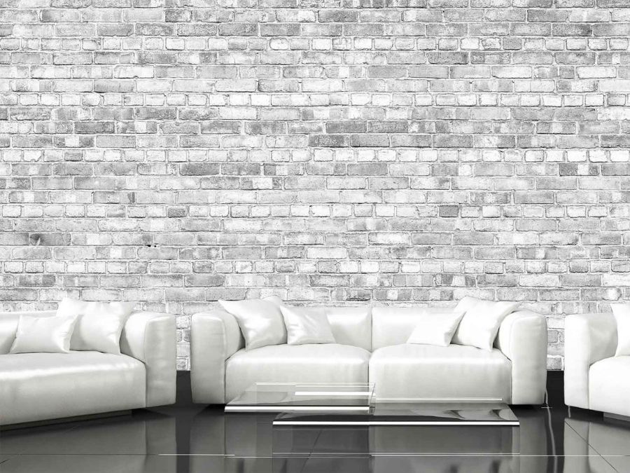 Old Brick Wall Mural Light Black and White, as seen in this white living room, features realistic grey bricks from About Murals.