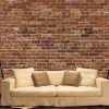 Orange Brick Wallpaper, as seen on the wall of this living room, is a high resolution photo mural of a modern, textured brick wall from About Murals.
