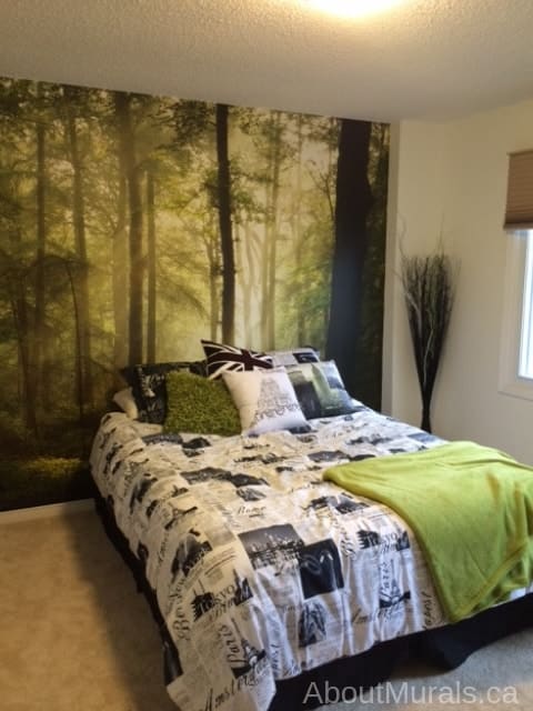 Play of Lights Wall Mural features a forest on removable wallpaper, as seen in this green bedroom. Easy wallpaper sold by AboutMurals.ca.