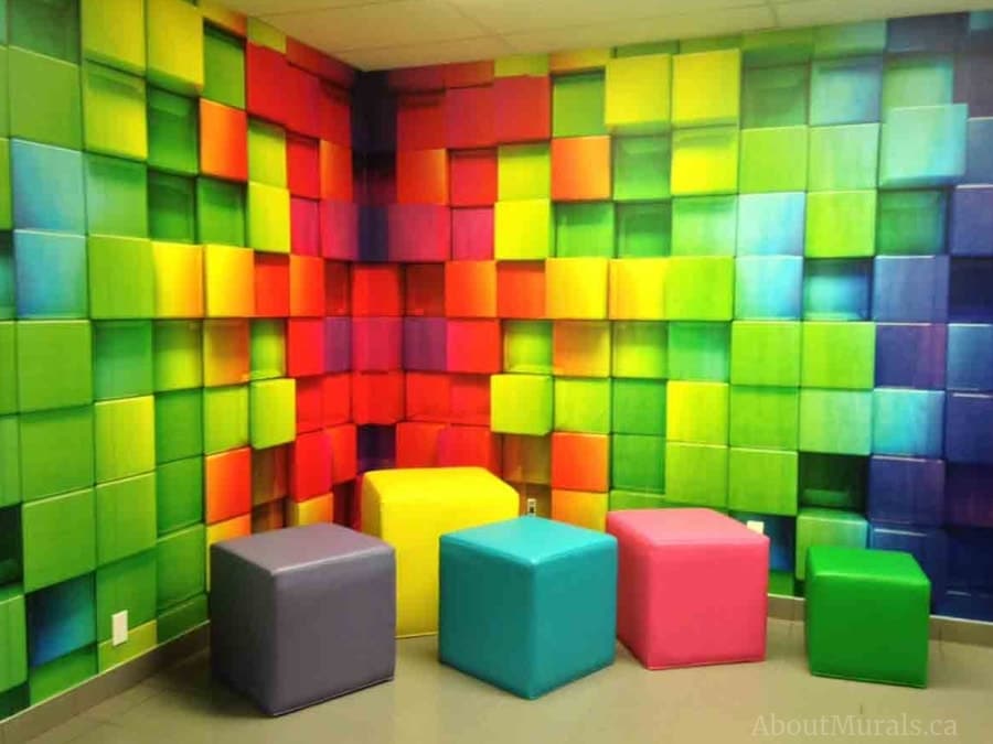 Rainbow Cubes Wall Mural, as seen in this lounge, features colourful 3D cube squares on two walls. Colourful wallpaper sold by AboutMurals.ca.