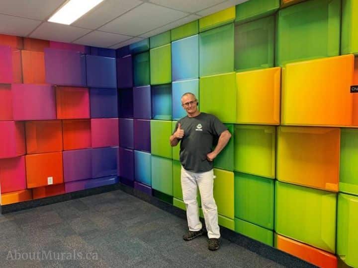 Rainbow Cubes Wall Mural, as seen in this office, features colourful 3D square cubes. Colorful wallpaper sold by AboutMurals.ca.