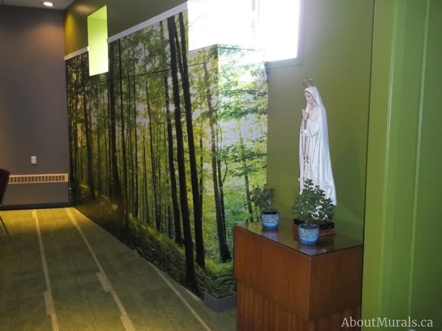 Shadows and Lights Wall Mural, as seen in this church room, features green trees in a spring forest. Forest wallpaper sold by AboutMurals.ca.
