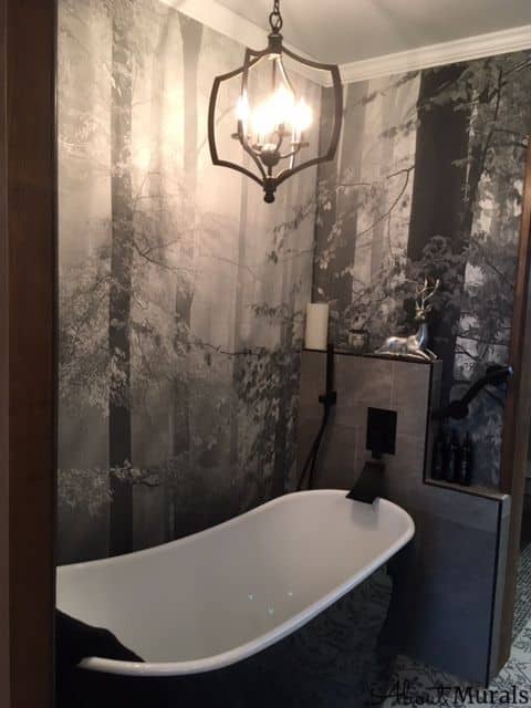 Sinfonia Della Foresta Black and White Wall Mural, as seen in this grey bathroom, features sun shining through an enchanted forest. Forest wallpaper sold by AboutMurals.ca.