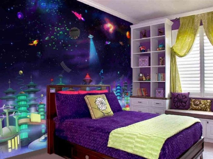 Space City Wall Mural, as seen in this bedroom, is an outer space wallpaper for kids featuring UFOs flying above an intergalactic city from About Murals.