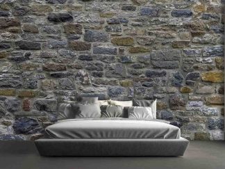 Stone Wall Mural, as seen on the wall of this bedroom, is a photo wallpaper of realistic textured stones from About Murals.