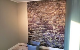 Vintage Brick Wallpaper is a rustic, distressed design that's so easy to hang that this customer installed it on his wall himself. Brick wallpaper sold by AboutMurals.ca