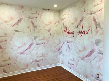 Custom Wallpaper with words and text over a floral design, as seen on the wall of Makeup Worx in Hamilton, Ontario, from About Murals.