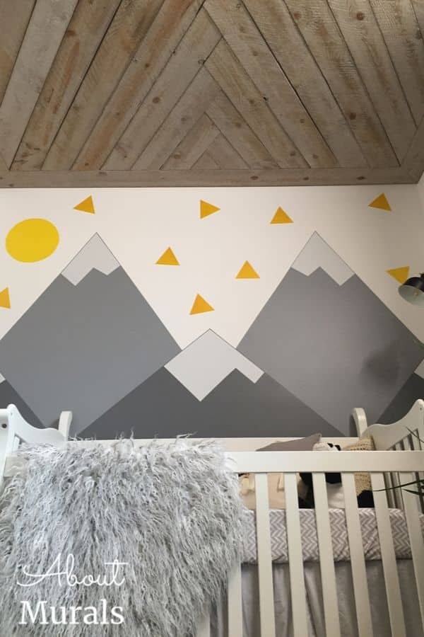 A DIY Mountain Mural over a crib